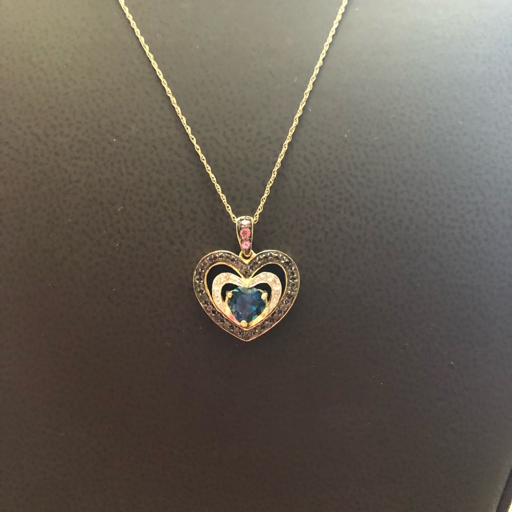10k Gold Blue Topaz and Diamond Heart Pendant.